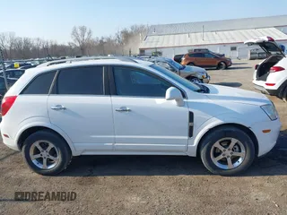 2014 Chevrolet Captiva Sport LT z VIN 3GNAL3EK8ES557432, wystawiony jako IAAI lot #42018256 z przebiegiem 92 569 mil mil oraz . Historia ofert i sprzedaży dostępna na DreamBid. Obrazek 13.