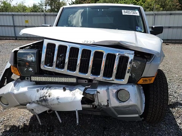 2007 Jeep Commander Sport z VIN 1J8HG48P47C691235, wystawiony jako Copart lot #64057505 z przebiegiem 135 641 mil mil oraz Szkoda całkowita • Salvage title. Historia ofert i sprzedaży dostępna na DreamBid. Obrazek 15.