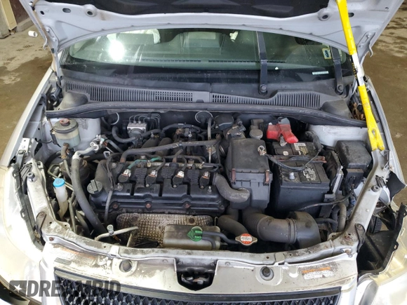 2010 Suzuki SX4 with VIN JS2YC5A49A6310256, listed as a Copart auction lot 73210584 with 135,021 mi miles and Salvage Title. Bid and sale history available at DreamBid. Image 12.