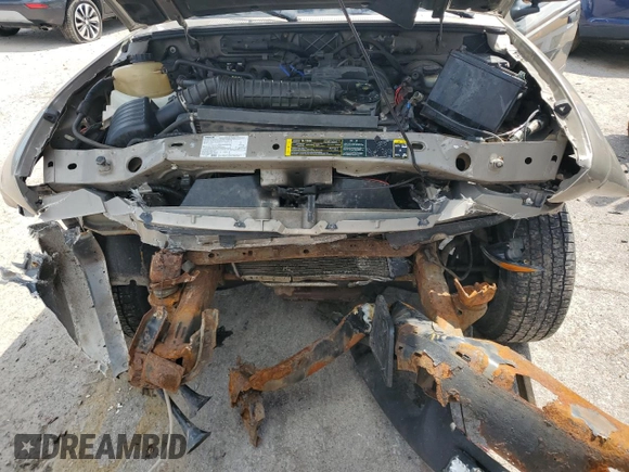 2004 Mazda B-Series Truck z VIN 4F4YR12D04TM03714, wystawiony jako Copart lot #58741095 z przebiegiem 79 633 mil mil oraz Szkoda całkowita • Salvage title. Historia ofert i sprzedaży dostępna na DreamBid. Obrazek 11.