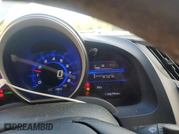 2012 Honda CR-Z with VIN JHMZF1D40CS000144, listed as a Copart auction lot 69488074 with 110,679 mi miles and Salvage Title. Bid and sale history available at carsss.com. Image 9.