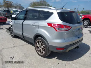 2014 Ford Escape Titanium с VIN 1FMCU0J9XEUB93591, выставлен на аукционе IAAI как лот 41721869 с пробегом 98 859 миль миль и . История ставок и продаж доступна на DreamBid. Изображение 3.