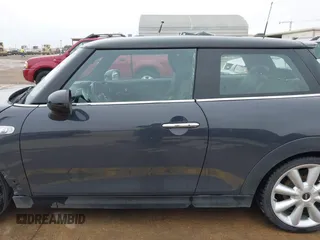2014 MINI Hardtop S with VIN WMWXM7C56ET926604, listed as a IAAI auction lot 41642560 with 81,219 mi miles and . Bid and sale history available at DreamBid. Image 14.