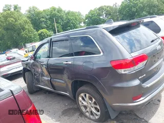 2020 Jeep Grand Cherokee Summit with VIN 1C4RJFJT0LC137054, listed as a IAAI auction lot 42235704 with 70,000 mi miles and . Bid and sale history available at DreamBid. Image 14.