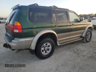 1999 Mitsubishi Montero Limited z VIN JA4LS41RXXP010154, wystawiony jako Copart lot #77666734 z przebiegiem Nie podano mil oraz Szkoda całkowita • Salvage title. Historia ofert i sprzedaży dostępna na DreamBid. Obrazek 3.