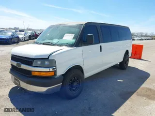 2014 Chevrolet Express Passenger LT with VIN 1GAZG1FG6E1181922, listed as a IAAI auction lot 41807855 with 42,907 mi miles. Bid and sale history available at carsss.com. Image 2.