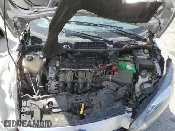 2019 Ford Fiesta SE z VIN 3FADP4EJ2KM142992, wystawiony jako Copart lot #55204795 z przebiegiem 98 018 mil mil oraz Szkoda całkowita • Salvage title. Historia ofert i sprzedaży dostępna na DreamBid. Obrazek 11.
