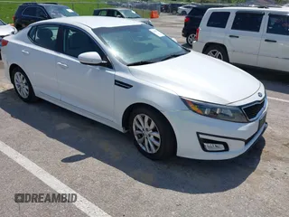 2015 Kia Optima LX with VIN 5XXGM4A76FG443962, listed as a IAAI auction lot 42069701 with 101,516 mi miles. Bid and sale history available at carsss.com. Image 1.