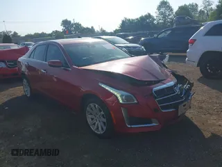 2014 Cadillac CTS Luxury AWD z VIN 1G6AX5SX8E0197579, wystawiony jako IAAI lot #42562096 z przebiegiem 89 055 mil mil oraz . Historia ofert i sprzedaży dostępna na DreamBid. Obrazek 1.