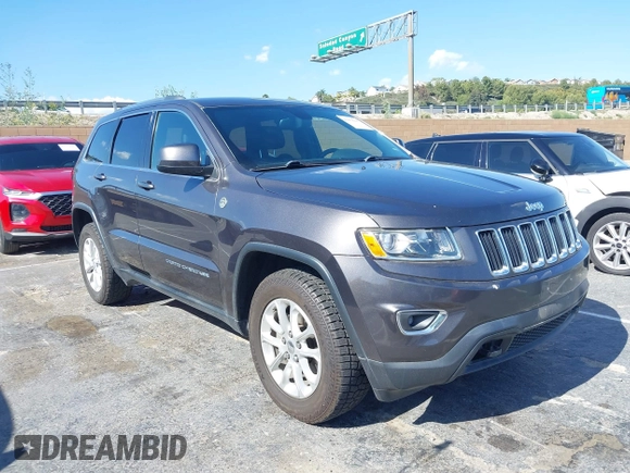 2016 Jeep Grand Cherokee Laredo z VIN 1C4RJFAG5GC390413, wystawiony jako IAAI lot #42254165 z przebiegiem 99 231 mil mil oraz . Historia ofert i sprzedaży dostępna na DreamBid. Obrazek 1.