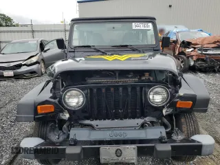 2002 Jeep Wrangler Sport with VIN 1J4FA49S12P730135, listed as a Copart auction lot 54477835 with 148,153 mi miles and Salvage title. Bid and sale history available at DreamBid. Image 5.