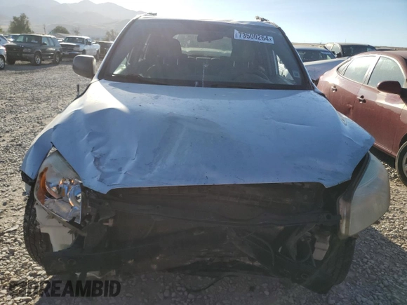 2007 Toyota RAV4 with VIN JTMBK35V975031463, listed as a Copart auction lot 73500264 with 96,689 mi miles and Salvage Title. Bid and sale history available at carsss.com. Image 5.