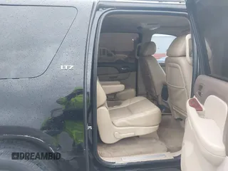 2011 Chevrolet Suburban LTZ with VIN 1GNSKKE32BR100379, listed as a IAAI auction lot 42115686 with 174,830 mi miles and . Bid and sale history available at DreamBid. Image 8.