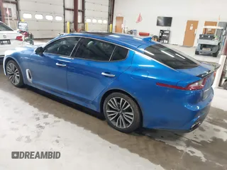2018 Kia Stinger Premium with VIN KNAE25LA5J6017132, listed as a IAAI auction lot 42163195 with 176,947 mi miles. Bid and sale history available at carsss.com. Image 3.