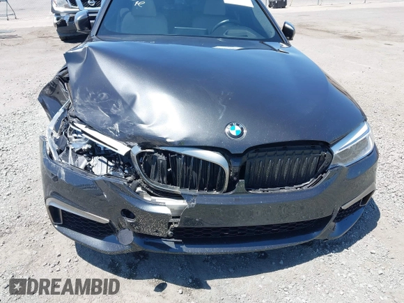 2020 BMW 5 Series M550i xDrive z VIN WBAJS7C07LBN96264, wystawiony jako IAAI lot #42478429 z przebiegiem 46 035 mil mil oraz . Historia ofert i sprzedaży dostępna na DreamBid. Obrazek 6.