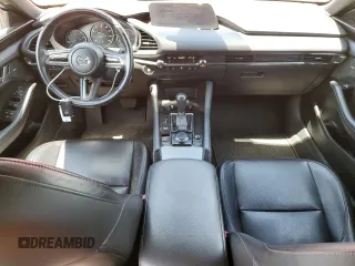 2021 Mazda 3 Premium with VIN JM1BPAML4M1317178, listed as a Copart auction lot 56008305 with 104,380 mi miles and Salvage title. Bid and sale history available at DreamBid. Image 8.