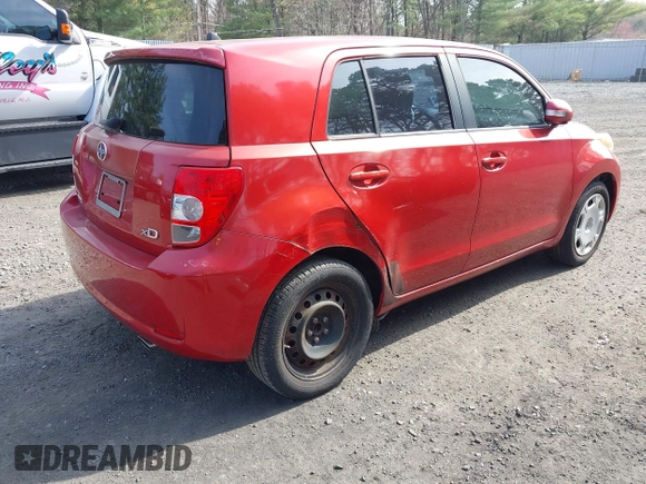 2010 Scion xD with VIN JTKKU4B43A1004049, listed as a IAAI auction lot 42088528 with 98,360 mi miles. Bid and sale history available at carsss.com. Image 4.