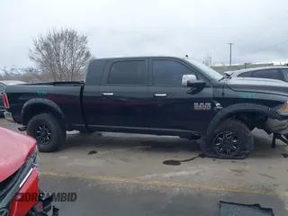 2015 Ram 2500 Laramie with VIN 3C6UR5NL2FG614941, listed as a IAAI auction lot 41785882 with 155,061 mi miles and . Bid and sale history available at DreamBid. Image 13.