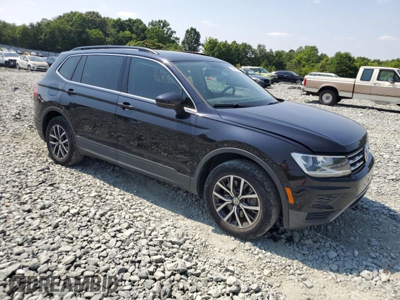 2019 Volkswagen Tiguan SE with VIN 3VV3B7AX9KM012693, listed as a Copart auction lot 59565615 with 137,276 mi miles and Salvage title. Bid and sale history available at DreamBid. Image 4.