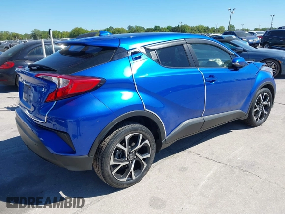 2018 Toyota C-HR XLE with VIN JTNKHMBXXJ1004583, listed as a IAAI auction lot 41836250 with 119,858 mi miles and . Bid and sale history available at DreamBid. Image 4.