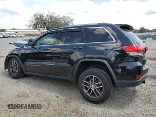 2018 Jeep Grand Cherokee Laredo E with VIN 1C4RJEAG1JC354221, listed as a Copart auction lot 58002715 with 108,223 mi miles and Salvage title. Bid and sale history available at DreamBid. Image 2.