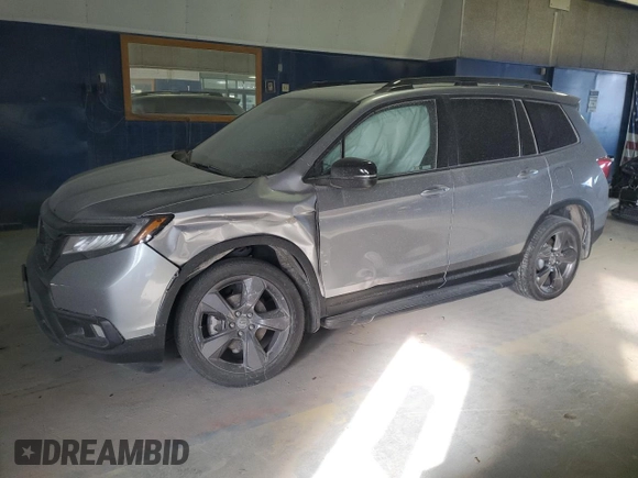 2021 Honda Passport Touring with VIN 5FNYF8H93MB010192, listed as a Copart auction lot 83013954 with Not Provided miles and Salvage Title. Bid and sale history available at carsss.com. Image 1.