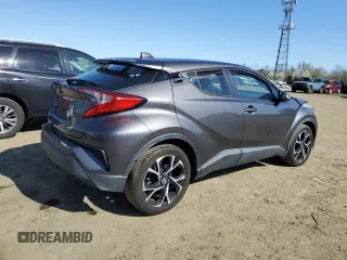 2019 Toyota C-HR XLE z VIN NMTKHMBX4KR084471, wystawiony jako Copart lot #52575985 z przebiegiem 54 578 mil mil oraz Szkoda całkowita • Salvage title. Historia ofert i sprzedaży dostępna na DreamBid. Obrazek 3.