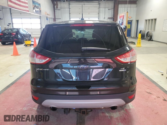 2014 Ford Escape SE with VIN 1FMCU9G99EUA06336, listed as a Copart auction lot 53871065 with 117,457 mi miles and Salvage title. Bid and sale history available at DreamBid. Image 6.
