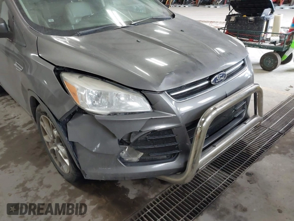 2014 Ford Escape Titanium with VIN 1FMCU9J90EUC31625, listed as a IAAI auction lot 41492075 with 301,917 mi miles and . Bid and sale history available at DreamBid. Image 6.