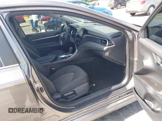 2023 Toyota Camry LE z VIN 4T1C11AK2PU080805, wystawiony jako IAAI lot #42165528 z przebiegiem 28 307 mil mil oraz . Historia ofert i sprzedaży dostępna na DreamBid. Obrazek 5.