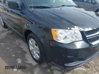 2017 Dodge Grand Caravan SE z VIN 2C4RDGBG3HR687183, wystawiony jako IAAI lot #41971615 z przebiegiem 158 201 mil mil oraz . Historia ofert i sprzedaży dostępna na DreamBid. Obrazek 6.