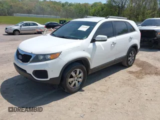 2011 Kia Sorento LX with VIN 5XYKT3A1XBG037157, listed as a IAAI auction lot 42041481 with 196,151 mi miles and . Bid and sale history available at DreamBid. Image 2.