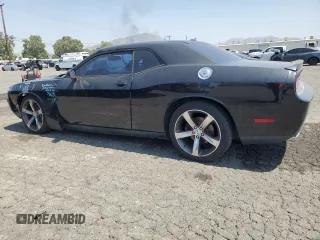 2014 Dodge Challenger R/T Plus z VIN 2C3CDYBT1EH294121, wystawiony jako Copart lot #60687575 z przebiegiem 121 607 mil mil oraz Szkoda całkowita • Salvage title. Historia ofert i sprzedaży dostępna na DreamBid. Obrazek 2.
