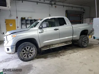 2014 Toyota Tundra 4WD Truck SR with VIN 5TFUY5F14EX337776, listed as a Copart auction lot 84216244 with 143,229 mi miles and Salvage Title. Bid and sale history available at carsss.com. Image 1.
