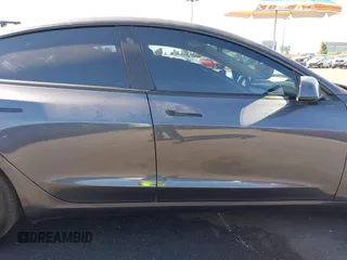 2023 Tesla Model 3 with VIN 5YJ3E1EA2PF640289, listed as a IAAI auction lot 42000200 with 14,194 mi miles and . Bid and sale history available at DreamBid. Image 14.