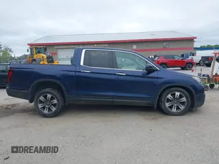 2017 Honda Ridgeline RTL-E with VIN 5FPYK3F78HB018267, listed as a IAAI auction lot 42299573 with 123,207 mi miles and . Bid and sale history available at DreamBid. Image 13.