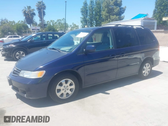 2003 Honda Odyssey EX-L z VIN 5FNRL189X3B151554, wystawiony jako IAAI lot #42297496 z przebiegiem 172 719 mil mil oraz . Historia ofert i sprzedaży dostępna na DreamBid. Obrazek 2.