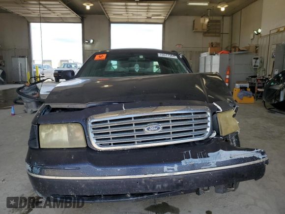 1999 Ford Crown Victoria Police с VIN 2FAFP71WXXX192272, выставлен на аукционе Copart как лот 73577384 с пробегом 278 535 миль миль и Списание • Salvage title. История ставок и продаж доступна на DreamBid. Изображение 5.