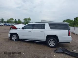 2019 GMC Yukon XL SLT with VIN 1GKS2GKC2KR369285, listed as a IAAI auction lot 40279008 with Not Provided miles and . Bid and sale history available at DreamBid. Image 14.