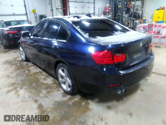 2014 BMW 3 Series 328i xDrive with VIN WBA3B3C57EF545372, listed as a IAAI auction lot 42078980 with 116,627 mi miles and . Bid and sale history available at carsss.com. Image 3.