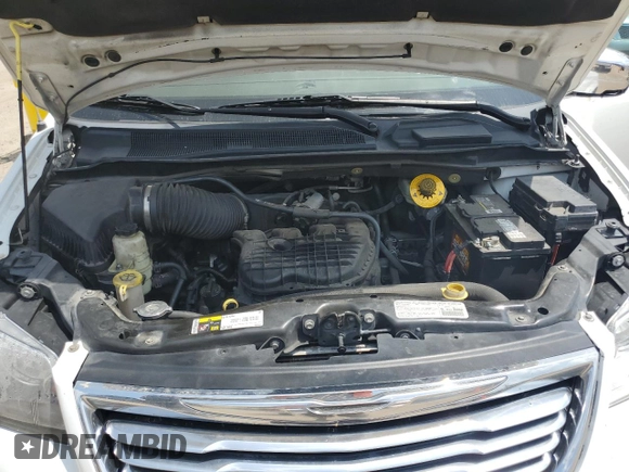2014 Chrysler Town & Country Touring L z VIN 2C4RC1CG9ER169668, wystawiony jako Copart lot #59629895 z przebiegiem 254 421 mil mil oraz Szkoda całkowita • Salvage title. Historia ofert i sprzedaży dostępna na DreamBid. Obrazek 12.