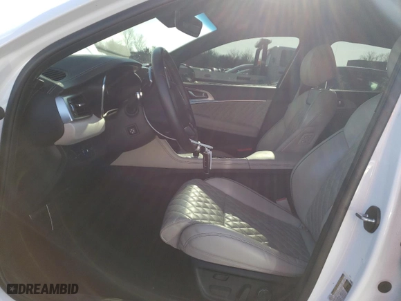 2022 Genesis G70 3.3T with VIN KMTG54TE7NU104131, listed as a Copart auction lot 85521034 with 59,735 mi miles and Salvage Title. Bid and sale history available at carsss.com. Image 7.