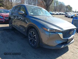 2023 Mazda CX-5 2.5 S Premium Plus Package with VIN JM3KFBEMXP0159401, listed as a IAAI auction lot 41657420 with 28,216 mi miles. Bid and sale history available at carsss.com. Image 1.