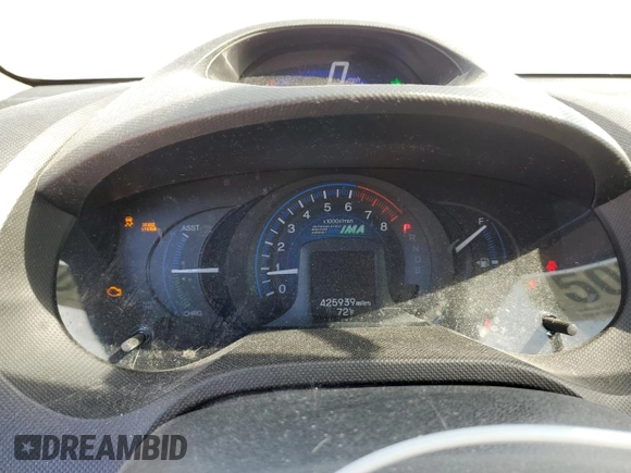 2012 Honda Insight EX z VIN JHMZE2H7XCS002156, wystawiony jako Copart lot #50825825 z przebiegiem 425 939 mil mil oraz Szkoda całkowita • Salvage title. Historia ofert i sprzedaży dostępna na DreamBid. Obrazek 9.