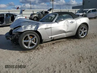 2009 Saturn Sky Red Line z VIN 1G8MT35X69Y104310, wystawiony jako Copart lot #87369754 z przebiegiem 62 428 mil mil oraz Szkody całkowita. Historia ofert i sprzedaży dostępna na DreamBid. Obrazek 1.