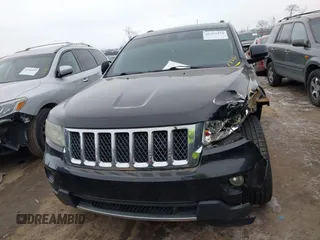 2013 Jeep Grand Cherokee Overland with VIN 1C4RJFCG1DC593890, listed as a IAAI auction lot 41264434 with 204,324 mi miles. Bid and sale history available at carsss.com. Image 11.