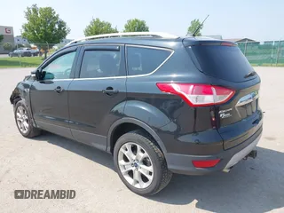 2015 Ford Escape Titanium with VIN 1FMCU9J96FUB58519, listed as a IAAI auction lot 42429369 with 125,541 mi miles and . Bid and sale history available at DreamBid. Image 3.
