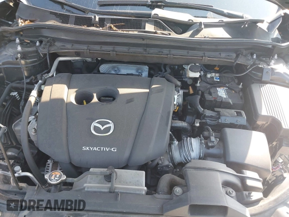 2020 Mazda CX-5 Touring with VIN JM3KFACM2L0770241, listed as a IAAI auction lot 42186952 with 41,590 mi miles and . Bid and sale history available at DreamBid. Image 10.