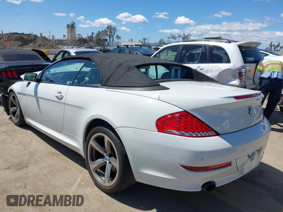 2009 BMW 6 Series 650i z VIN WBAEB53579CX64649, wystawiony jako IAAI lot #41937705 z przebiegiem 136 164 mil mil oraz . Historia ofert i sprzedaży dostępna na DreamBid. Obrazek 3.