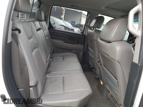 2010 Honda Ridgeline RTL with VIN 5FPYK1F58AB005088, listed as a Copart auction lot 47477975 with 128,538 mi miles and Salvage Title. Bid and sale history available at carsss.com. Image 10.